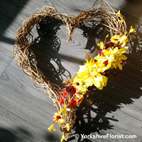 Autumn gold twiggy love heart yellow orange silk flower arrangement