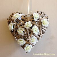 Shabby chic wicker heart with silk daisy chrysanthemums