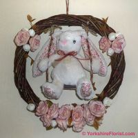 willow wreath with roses and swinging bunny
