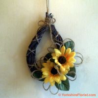 shabby chic wooden teardrop with sunflowers